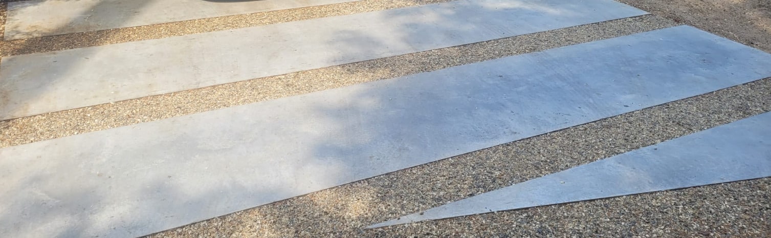 AV Betonvloeren realiseert een sterkte oprit van beton met verlijmd grind